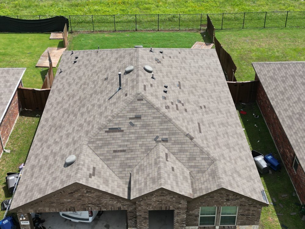 Slide of Taylored Roofing