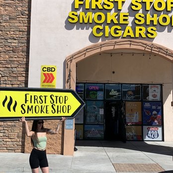 First Stop Smoke Shop - a woman standing in front of a store - Beer, Wine & Spirits Near Me - Phoenix, Arizona First Stop Smoke Shop - a woman standing in front of a store - Beer, Wine & Spirits Near Me - Phoenix, Arizona