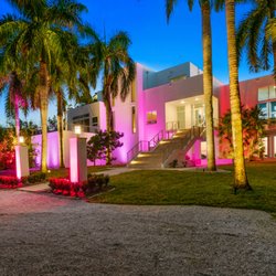 Enhance your home's beauty with a mix of white and color uplights.