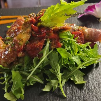 Trattoria 360 - Proscuitto wrapped prawns on arugula salad, calabrian pepper sauce - Italian Near Me - Campbell, California Trattoria 360 - Proscuitto wrapped prawns on arugula salad, calabrian pepper sauce - Italian Near Me - Campbell, California