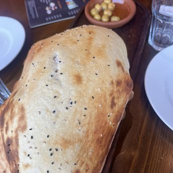 Zara Forest Turkish Cousine - Puff pita bread and olives - Turkish Near Me - Staten Island, New York Zara Forest Turkish Cousine - Puff pita bread and olives - Turkish Near Me - Staten Island, New York