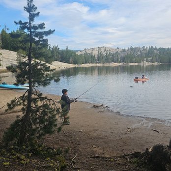 Utica Reservoir Sandy Flat Campground - My son fishing at Sandy Flat - Campgrounds Near Me