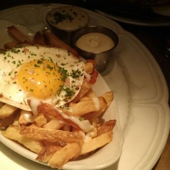 Au Cheval - Fries with egg. - Bars Near Me - Chicago, Illinois Au Cheval - Fries with egg. - Bars Near Me - Chicago, Illinois