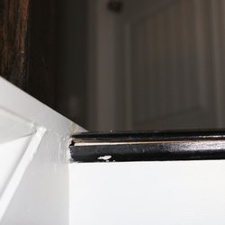 Superior Flooring - Look how horrible they installed this trim! They refuse to come back and fix this gap.