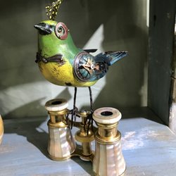 Artisans Gallery - Mullanium Bird on Binoculars, Pompano Beach FL