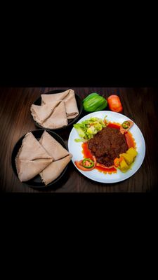 Photo of Asmara Restaurant - Oakland, CA, US. Keywatt (beef stew)