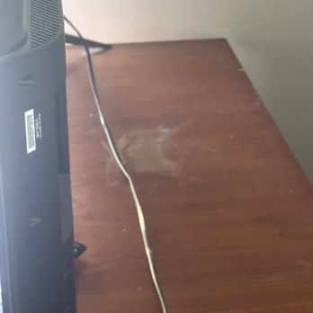 Linda's Cleaning Service - Dirt behind my bedroom TV countertop. Cleaned the front of the TV area, but not the back???? - Office Cleaning Near Me - Lancaster, California