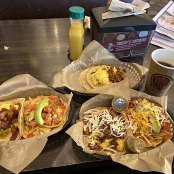 Torchy's Tacos - Chorizo, bacon and a speciality breakfast taco without cheese. The two with cheese are bacon and special. - Tacos Near Me - Austin, Texas