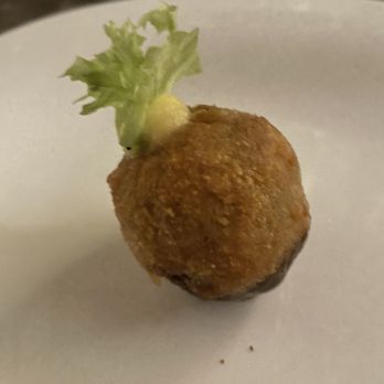 Restaurante Milpa Holbox - Fried rice ball dipped in mole sauce - Mexican Near Me - Holbox, ROO Restaurante Milpa Holbox - Fried rice ball dipped in mole sauce - Mexican Near Me - Holbox, ROO