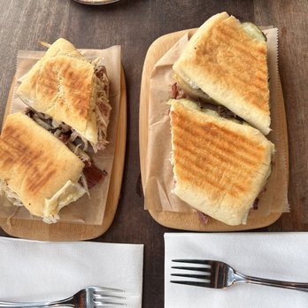 Duckfat - on the left (top) it's the MONTREAL REUBEN and on the right (bottom) it's the HOUSE SMOKED PULLED PORK CUBANO - New American Near Me - Portland, Maine Duckfat - on the left (top) it's the MONTREAL REUBEN and on the right (bottom) it's the HOUSE SMOKED PULLED PORK CUBANO - New American Near Me - Portland, Maine