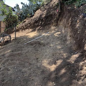 FM Design & Construction - Leveling the dirt for fence. - General Contractors Near Me