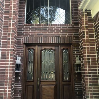 Fish Window Cleaning - The window is so clean you can see a perfect reflection of the sky and trees. - Window Washing Near Me - Spring, Texas