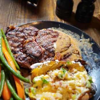 Hotel Sutter Restaurant - my prime ribeye steak with loaded baked potatoe - New American Near Me - Sutter Creek, California