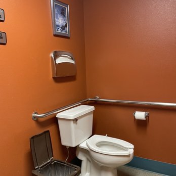 Naung Mai Thai Kitchen - a toilet and trash can - Thai Near Me - Oak Harbor, Washington