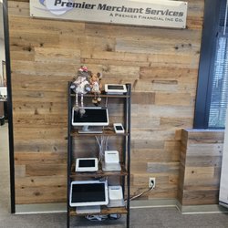 Premier Merchant Services - POS equipment demos in our new lobby.