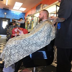 JB's Barber Shop #5 - Watching and waiting for our turn. Very talented barbers
