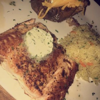 Stoney River - Grilled Scottish Salmon "naked" with jasmine rice and loaded baked potato. - Steakhouses Near Me - Annapolis, Maryland