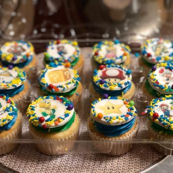 Ericasweets Bakery - a tray of decorated cupcakes - Desserts Near Me