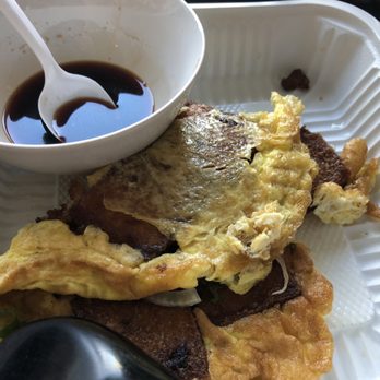 Thien Long - 1/2 eaten egg cake appetizer with dipping sauce (the fam couldn't wait for me to take the pic!) - Vietnamese Near Me - San Jose, California