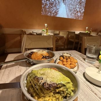 Capri Lasagneria - They have a movie being projected on the wall - Italian Near Me - Burlingame, California