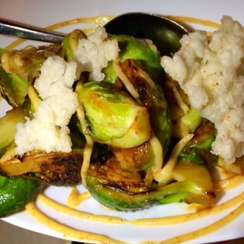 Spago - Roasted Brussel sprouts, Miso Mustard Glaze, Crispy Rice Crackers - New American Near Me - Beverly Hills, California Spago - Roasted Brussel sprouts, Miso Mustard Glaze, Crispy Rice Crackers - New American Near Me - Beverly Hills, California