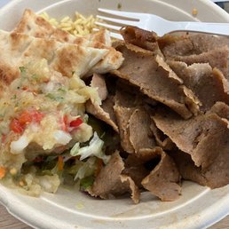 Oops ate some of this lamb/beef yeero bowl $15.75 before taking a pic Oops ate some of this lamb/beef yeero bowl $15.75 before taking a pic