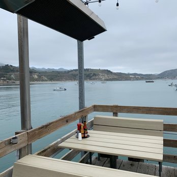 Mersea's - Pier seating with overhead heater - Bars Near Me - Avila Beach, California Mersea's - Pier seating with overhead heater - Bars Near Me - Avila Beach, California