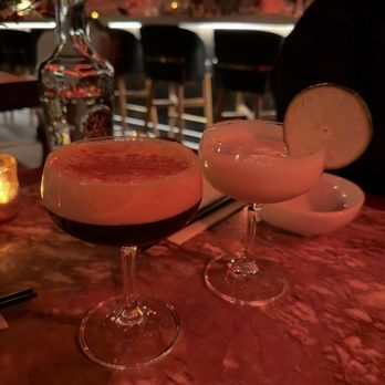 Saigon Babylon - Honey mousse espresso martini (left) and stormy Saigon (right) - Cocktail Bars Near Me - Cambridge, Massachusetts