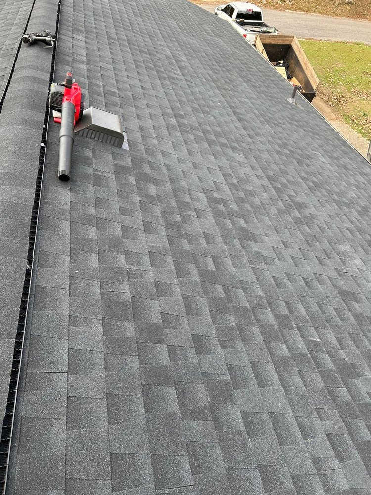 Slide of Dos Amigos Roofing