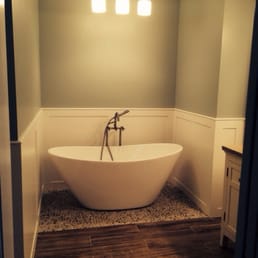 Wood tile, pebble floor, and shaker board...turned out amazing ! Wood tile, pebble floor, and shaker board...turned out amazing !