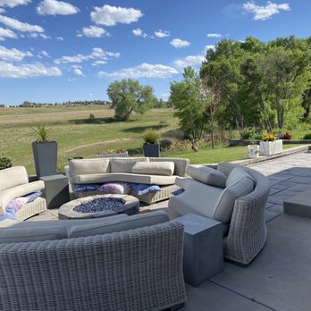 Aspenwood Landscape - The patio, wall and pavers, sod on other side of the wall that was built. - Landscaping Near Me - Parker, Colorado