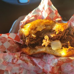 My Husband's almost gone chopped beef sandwich with sautéed onions