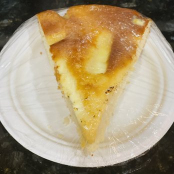 Angie's Bakery - Bibingka 9those lighter patches are cream cheese or some soft, creamy type cheese) - Bakeries Near Me - Virginia Beach, Virginia