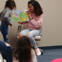 Child Care Links - My daughter reading with wonderful staff member of Child Care Links