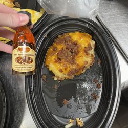 Loaded Hashbrown casserole in comparison to the bottle of syrup given