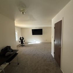 Mountain Oaks Apartments - Front door to living room.