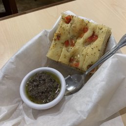 Yummy focaccia bread with olive tapenade Yummy focaccia bread with olive tapenade