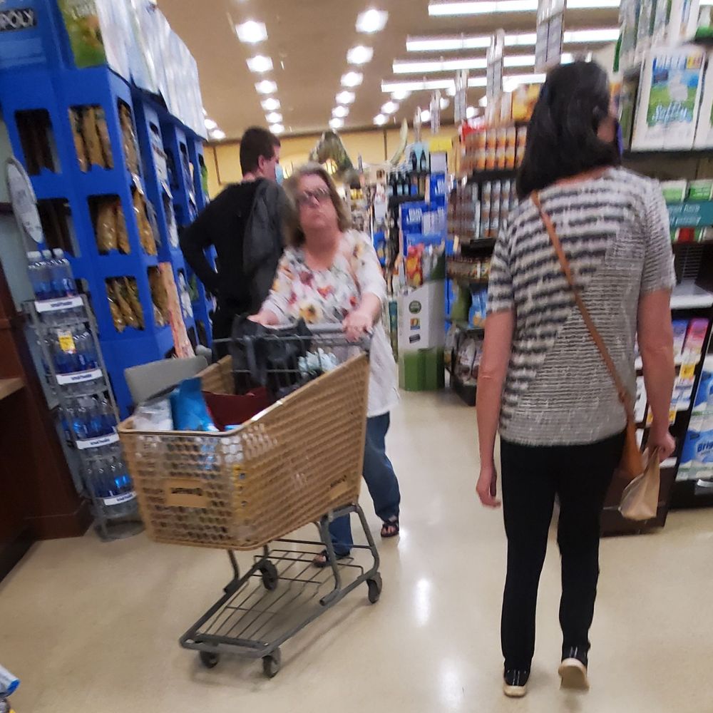Customer without a face mask Customer without a face mask