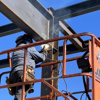 Huddle Steel Buildings - a man welding steel - General Contractors Near Me - Canton, Texas Huddle Steel Buildings - a man welding steel - General Contractors Near Me - Canton, Texas