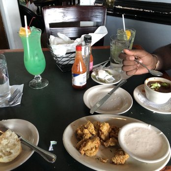 Cajun Queen - Fried oysters Delish! Most restaurants overdo the batter to the point you cant taste the meat, but this was PERFECT Seafood gumbo back dish - Cajun/Creole Near Me - Charlotte, North Carolina