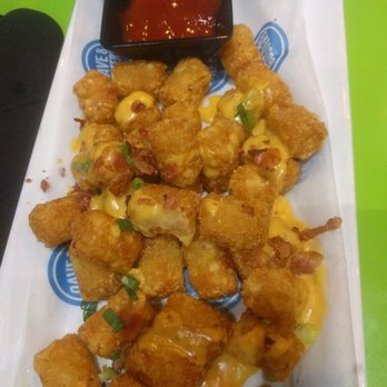 Dave & Buster's Denver - Menu showed a giant pile of tater tots covered in cheese sauce $12 for this is a joke. Pictures are incredibly misleading - American Near Me - Denver, Colorado