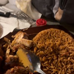 Tfk african restaurant - Jollof rice, beef with fish