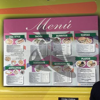 Tacos Y Antojitos Emanuel - a man standing in front of a food truck - Food Trucks Near Me - West Palm Beach, Florida Tacos Y Antojitos Emanuel - a man standing in front of a food truck - Food Trucks Near Me - West Palm Beach, Florida