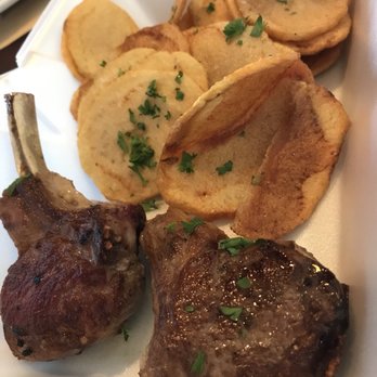 Dinnerhorn Restaurant - Lamb lollipops after we had eaten half and boxed them up. - Pizza Near Me - Portsmouth, New Hampshire Dinnerhorn Restaurant - Lamb lollipops after we had eaten half and boxed them up. - Pizza Near Me - Portsmouth, New Hampshire