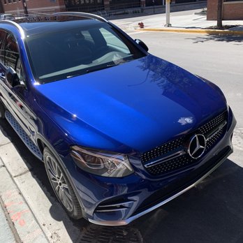 Carrectly Auto Care - Spotless front right side of a AMG GLC 43 Mercedes in Electric Blue paint with 20" wheels. - Auto Detailing Near Me - Chicago, Illinois