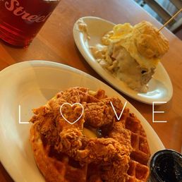 Chicken (with a slight kick) and waffles and their biscuit smothered in sausage gravy with a chicken Pattie between along with cheesy eggs! Chicken (with a slight kick) and waffles and their biscuit smothered in sausage gravy with a chicken Pattie between along with cheesy eggs!