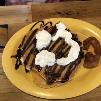 Asiel's Restaurant - Children's chocolate chip pancakes (2) with bacon. - New American Near Me - Lake Jackson, Texas Asiel's Restaurant - Children's chocolate chip pancakes (2) with bacon. - New American Near Me - Lake Jackson, Texas