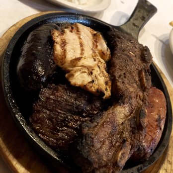 La Patagonia Argentina - Parrillada: steak, short ribs, flap meat, sausage, blood sausage and sweetbreads - Latin American Near Me - Miami, Florida La Patagonia Argentina - Parrillada: steak, short ribs, flap meat, sausage, blood sausage and sweetbreads - Latin American Near Me - Miami, Florida