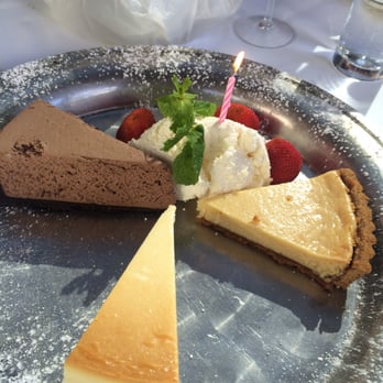 Wolfgang's Steakhouse - Chocolate mousse pie cheesecake, key lime pie and fresh whipped cream with strawberries. Fantastic! - Steakhouses Near Me - Honolulu, Hawaii Wolfgang's Steakhouse - Chocolate mousse pie cheesecake, key lime pie and fresh whipped cream with strawberries. Fantastic! - Steakhouses Near Me - Honolulu, Hawaii