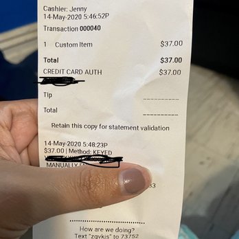 La Bamba Grill - a hand holding a receipt - Mexican Near Me - Dover, New Jersey